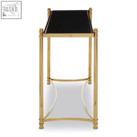 Ackley gold console table with gold finish metal frame black glass top and curved support legs