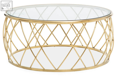 Ackley gold round coffee table features a gold-finished metal frame with clear glass top and diamond-patterned design