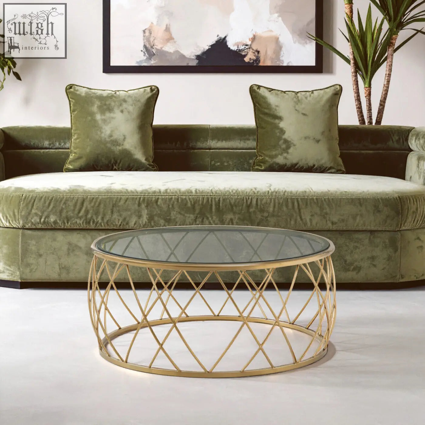Ackley gold round coffee table with clear glass top and geometric gold wireframe base for stylish living rooms