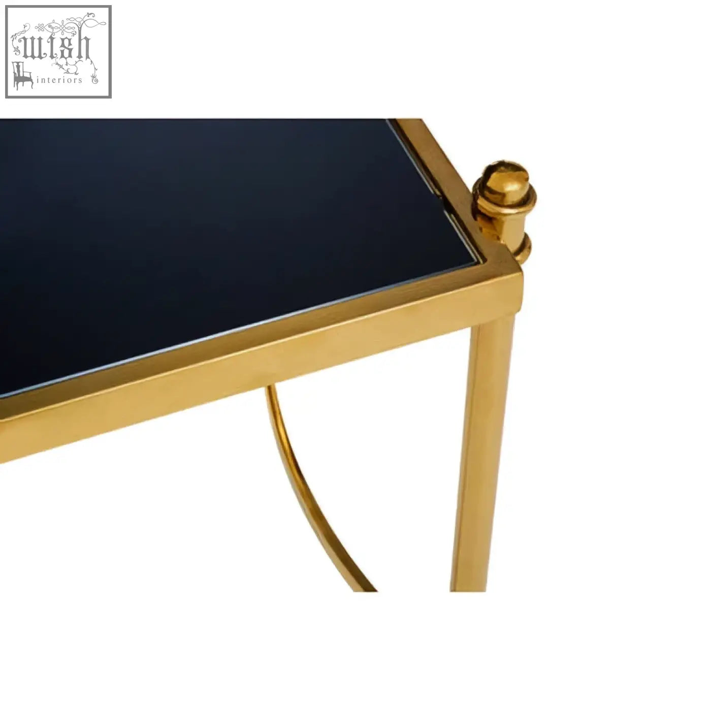 Ackley gold side table with black glass top and gold stainless steel frame featuring ornate spherical finials