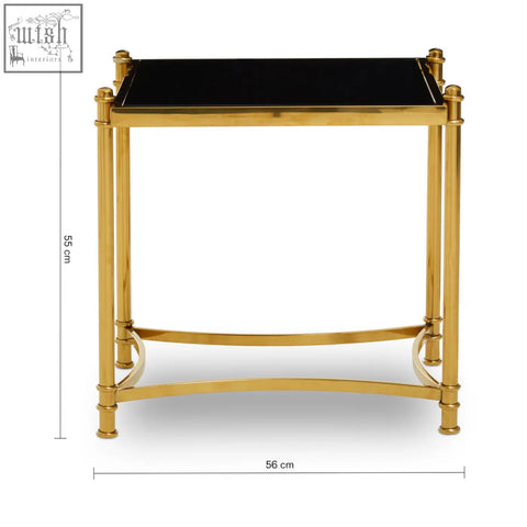 Sleek ackley gold side table with black glass top and polished stainless steel curved legs for stylish living spaces