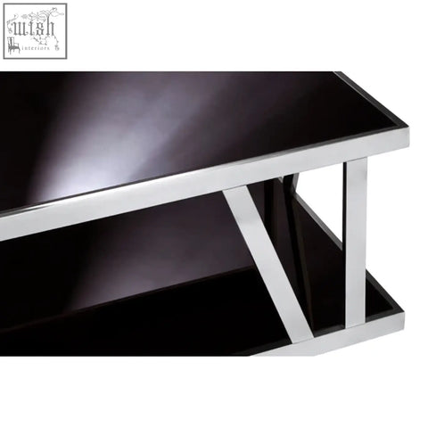Ackley silver coffee table with black glass top and stainless steel chrome legs in a modern geometric design