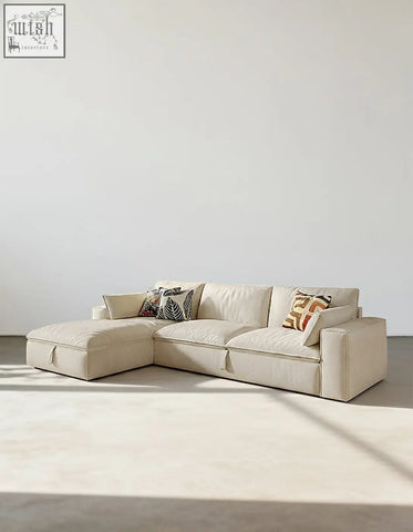 Beige suede acosta corner sofa bed with storage featuring modern minimalist design and decorative throw pillows