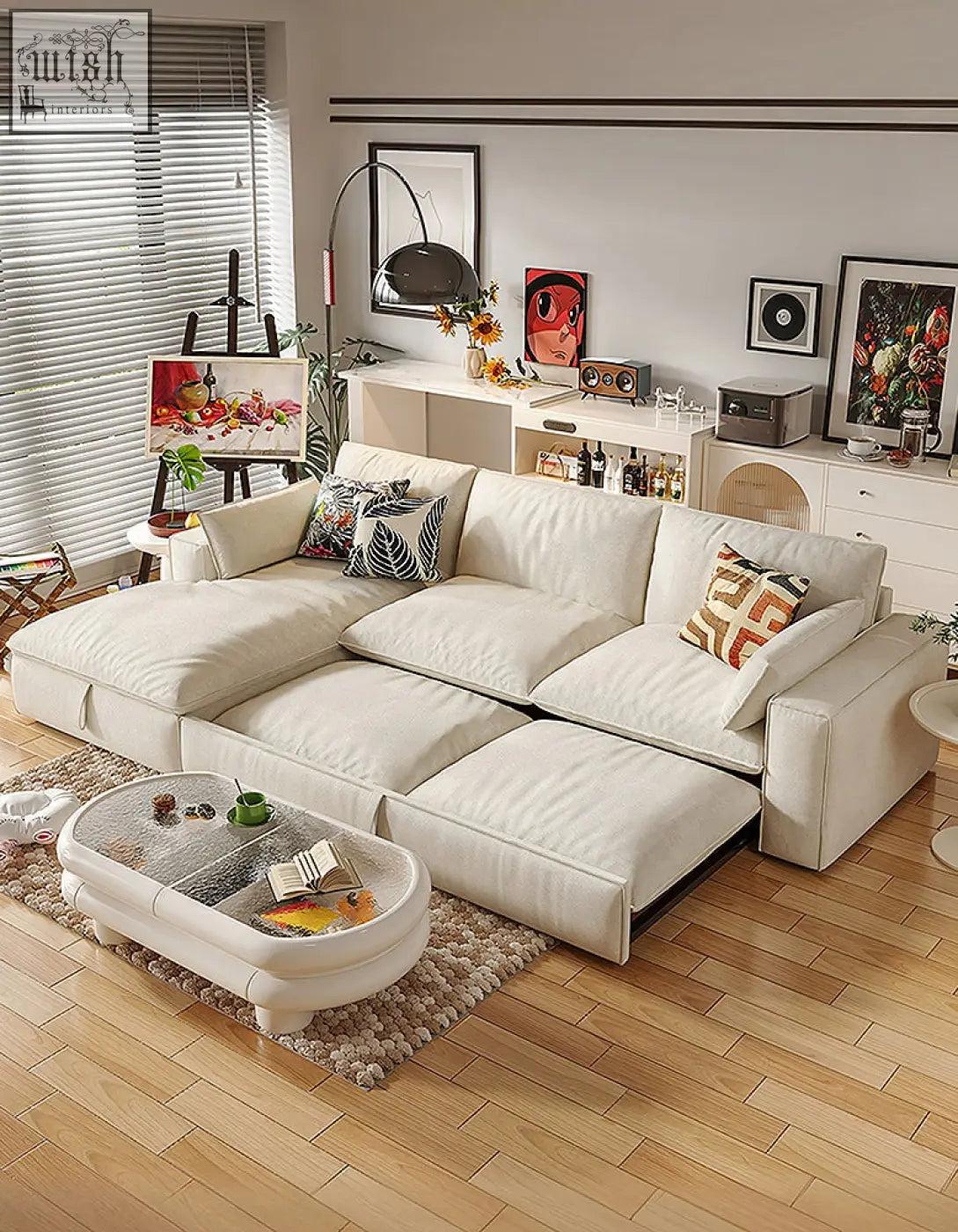 Cream colored suede corner sofa bed with plush cushions and storage in a modern minimalist design