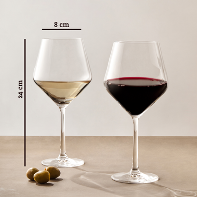 A pair of clear crystal burgundy glasses with slender stems holding white and red wine, 24 cm tall and 8 cm rim