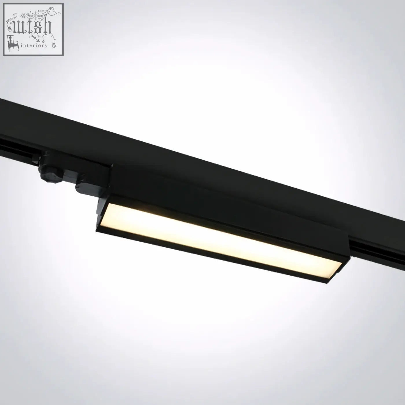 Black adjustable led linear track light with sleek rectangular design and warm white led illumination