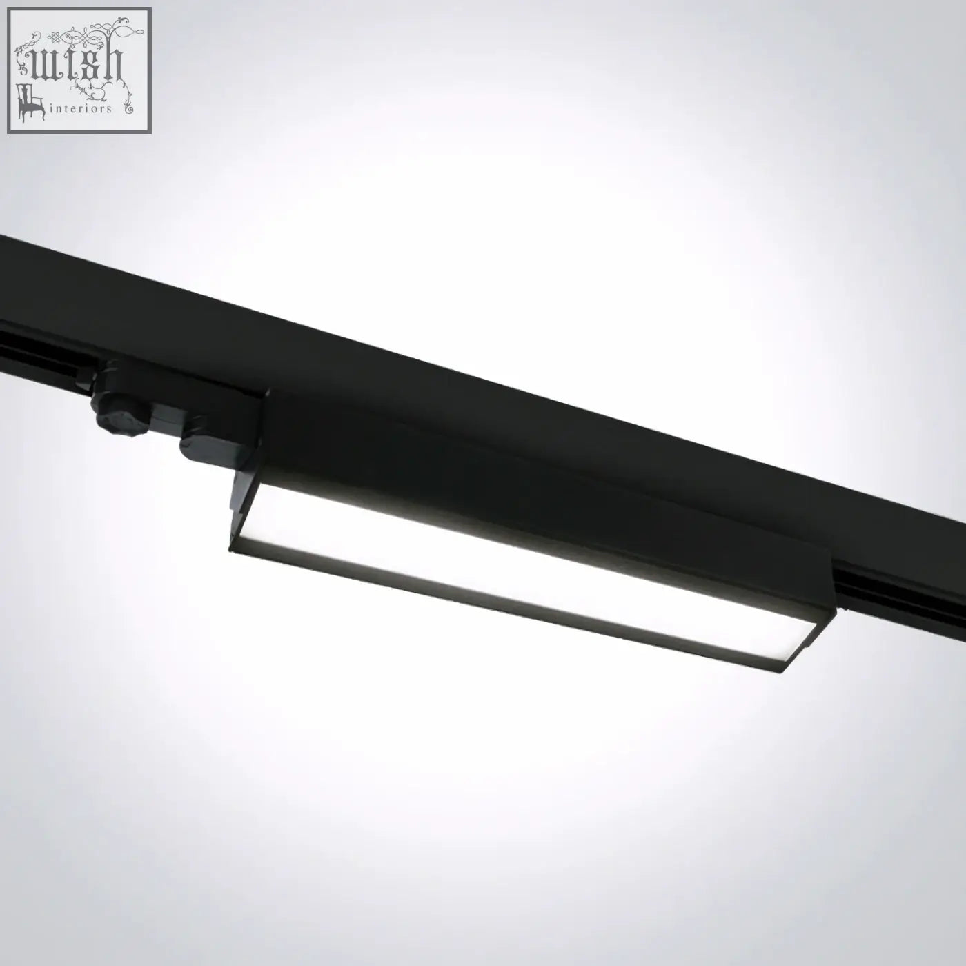 Black adjustable led linear track light with sleek design and frosted glass diffuser for modern lighting
