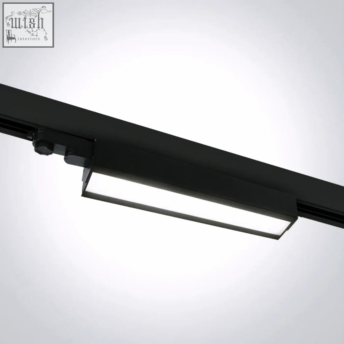 Black adjustable led linear track light with sleek design and frosted glass diffuser for modern lighting