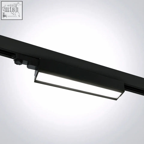 Black adjustable led linear track light with sleek design and frosted glass diffuser for modern lighting