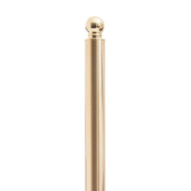 Adler gold finish toilet roll holder with polished gold finish metal flagpole and spherical finial at the top