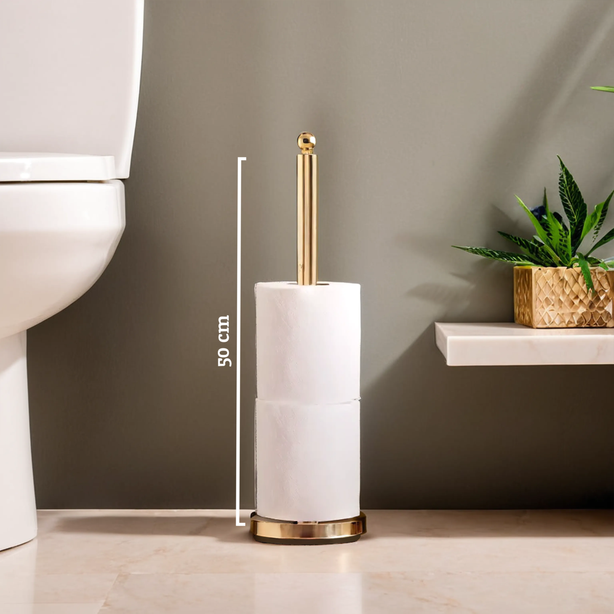Adler gold finish gold tone toilet roll holder with sleek cylindrical design and two stacked white rolls of toilet paper