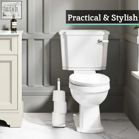 Modern adler white toilet with matching tank and seat paired with a sleek white toilet roll holder