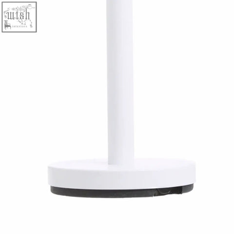 Adler white toilet roll holder with a white cylindrical stand and black rubberized foot for sturdy support