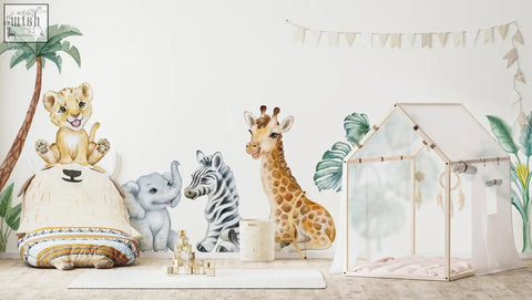 A charming white and beige childrens playhouse with wooden frame details paired with safari wall decals and african animals stickers
