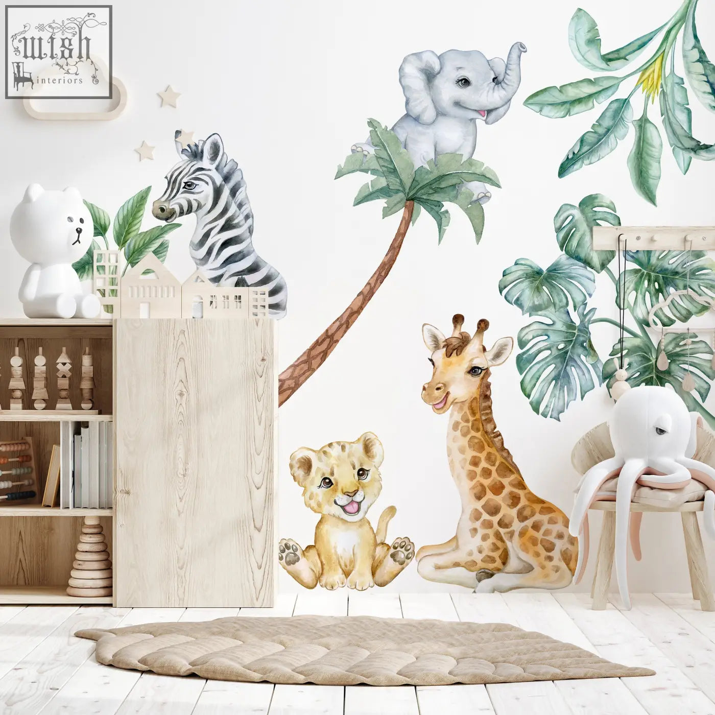 A charming safari wall decal with playful elephant zebra giraffe and lion cub in lush tropical foliage for kids room