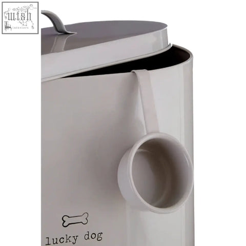 A sleek matte white ceramic canister with lid and scoop handle for adore pets lucky dog food storage bin 12ltr