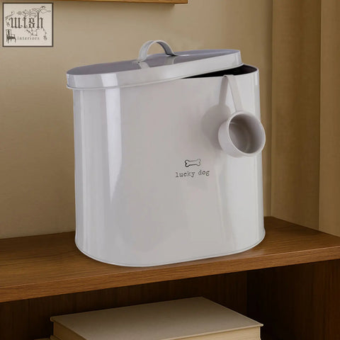 White enamel lucky dog food storage bin with bone logo and side scoop for easy measuring and storing dog food