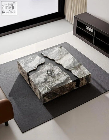 Modern aesop low coffee table with a black and white rectangular marble top and dark wood frame square marble coffee table