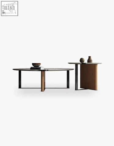 Modern minimalist agatha nesting coffee table with black stone top and slender metal legs plus bronze side table