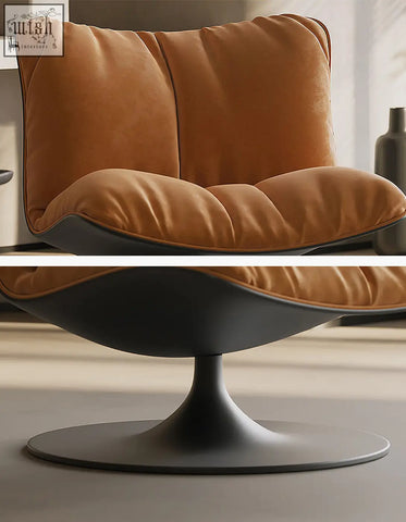A modern tan velvet swivel lounge chair with a sleek black pedestal base perfect for relaxing spaces