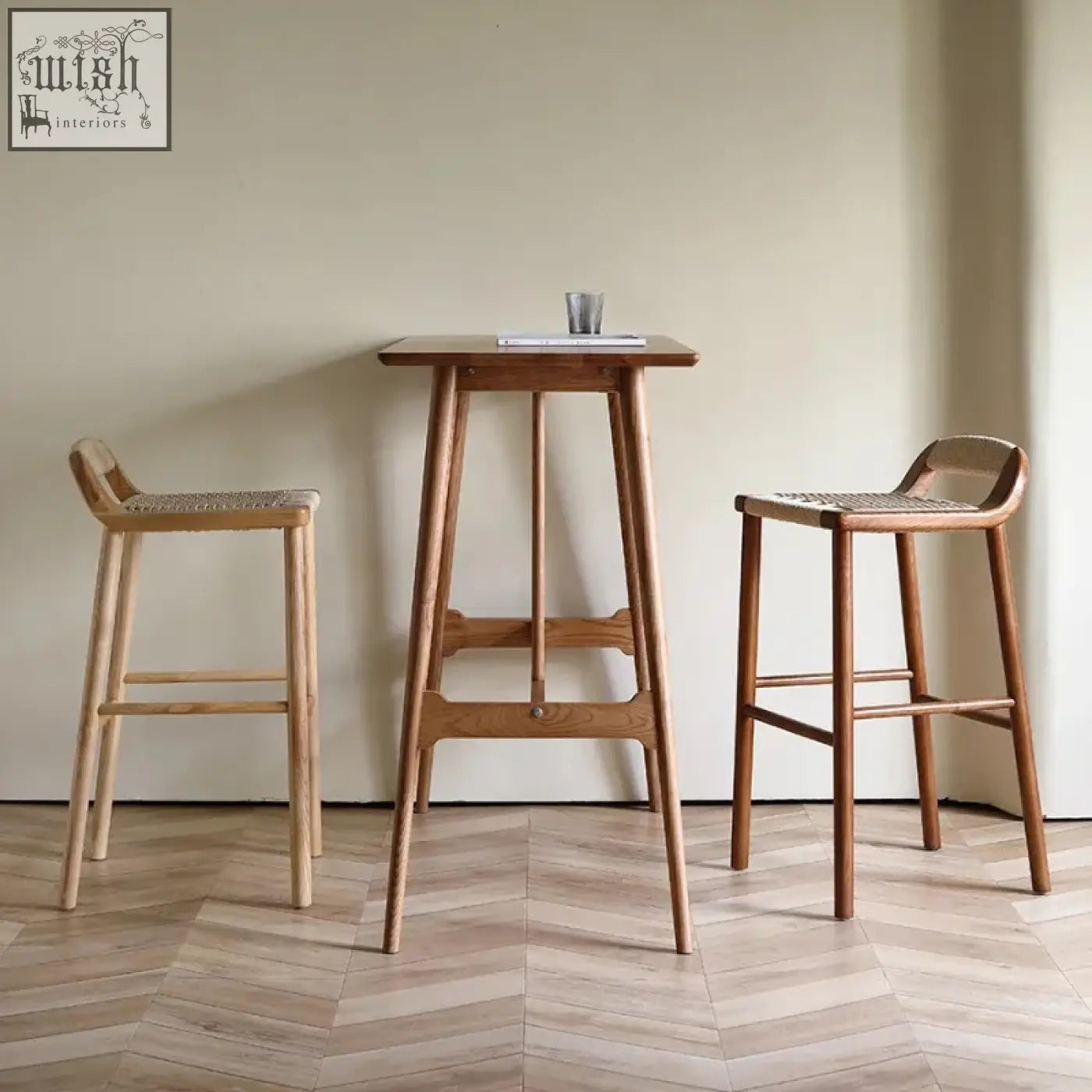 Light wood finish Aiko bar stool with slender legs and woven seat made from solid ash wood in warm walnut finish