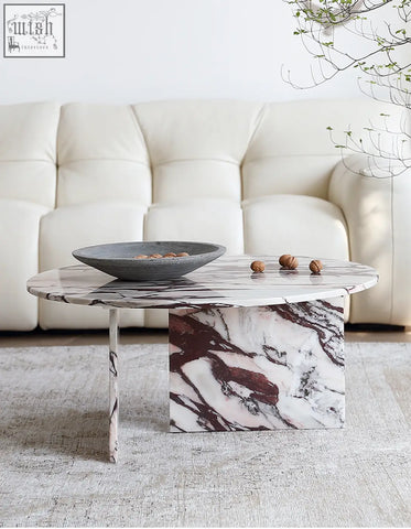 Aiko coffee table round marble with a sleek oval white and burgundy stone coffee table top and matching pedestal base