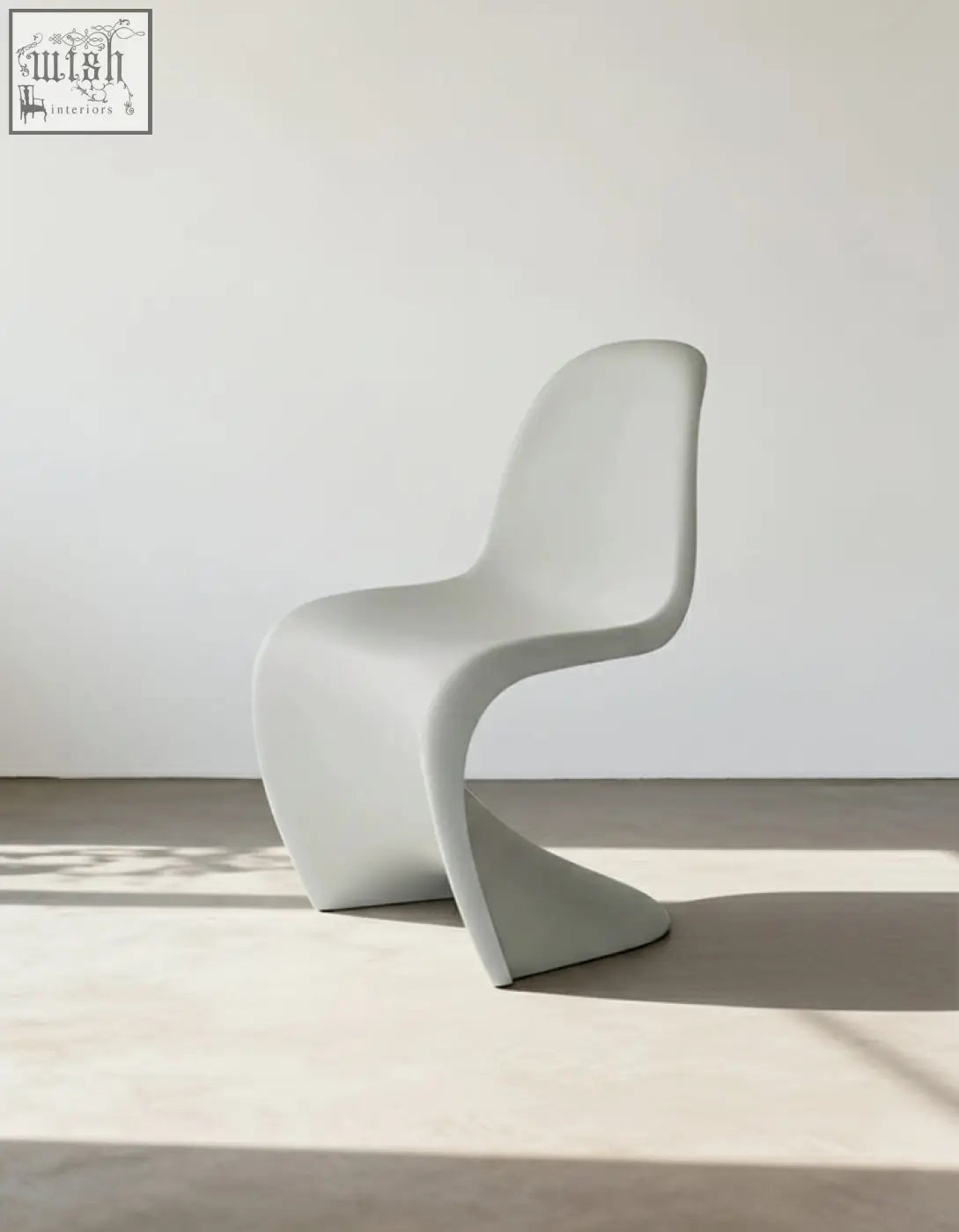 Aimee dining chair white plastic with sleek minimalist design and smooth molded body perfect dining chair