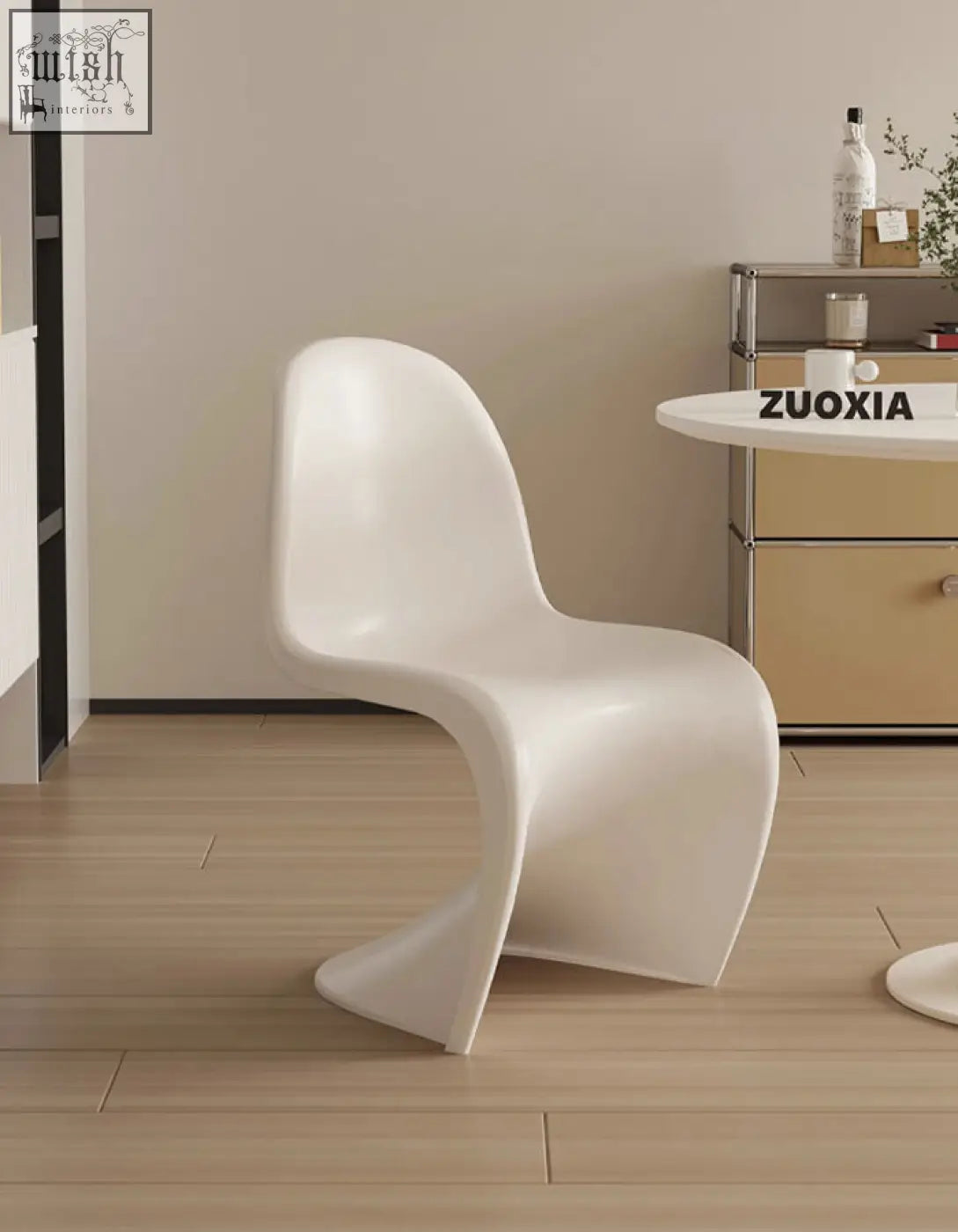 White molded plastic dining chair with sleek modern design perfect for aimee dining spaces