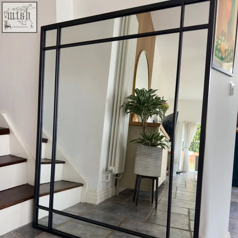 Aimi black window mirror with black metal grid frame and multiple rectangular panes in sleek modern design 95cm x 120cm