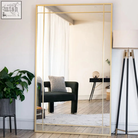 A tall aimi gold metal full length rectangle window mirror with segmented glass panels 180cm x 90cm