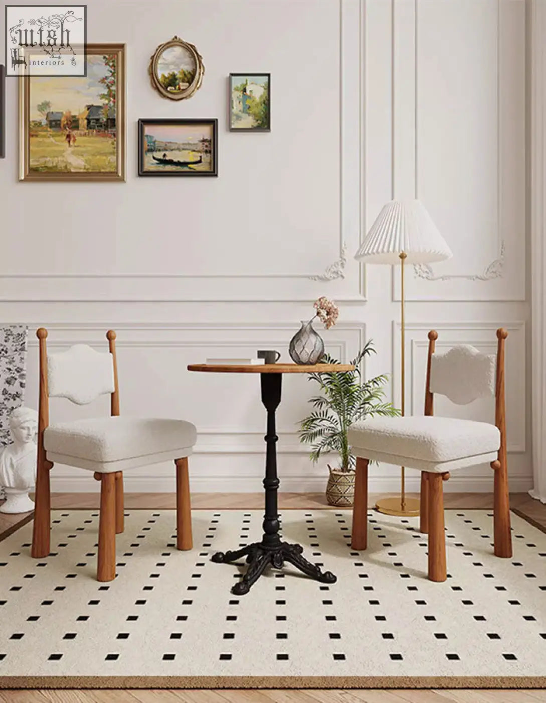 A pair of ainsley dining chairs with wooden frames and cashmere beige upholstered seats and carved tops