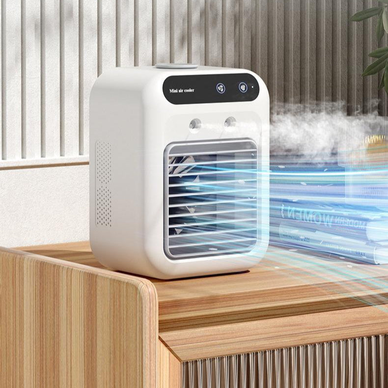White compact portable air conditioner with black control panel uses atomization technology for room and office cooling