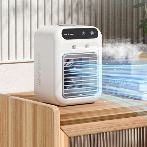 White compact portable air conditioner with black control panel uses atomization technology for room and office cooling