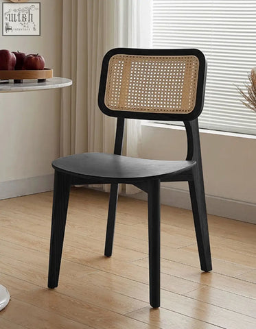 Black wooden aislin rattan dining chair with woven cane backrest perfect for stylish dining chair setups
