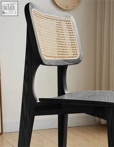 Black wooden aislin rattan dining chair with woven cane backrest perfect for stylish dining chair setups