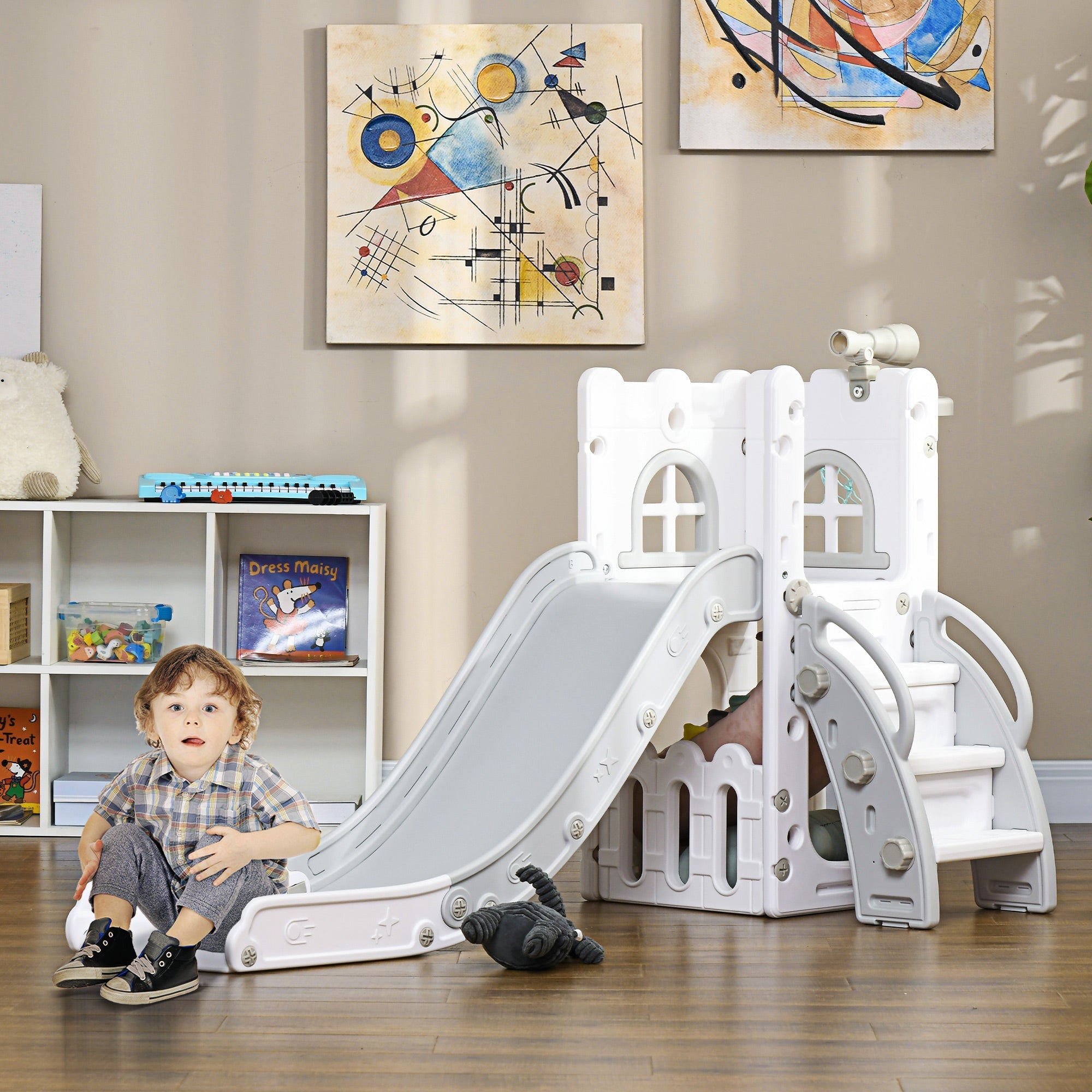 White plastic kids slide with gray staircase featuring four-in-one design and storage basket for toddlers ages 1-3 years