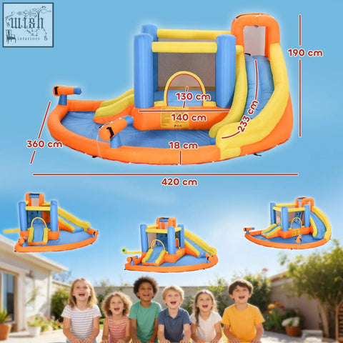 Bright orange and blue inflatable bouncy castle with climbing wall water cannons dual slides and bounce house section