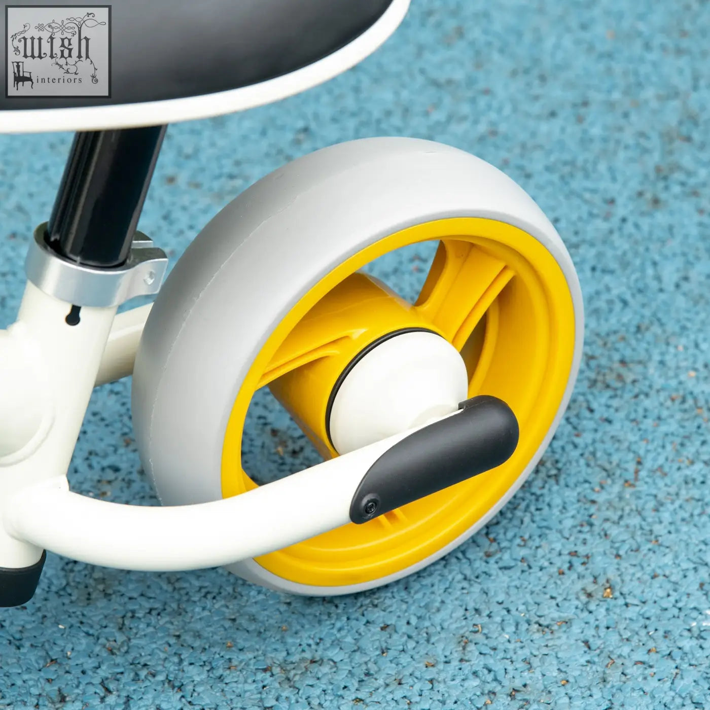 Orange aiyaplay balance bike wheel with bright yellow rim white tire black grip featuring eva wheels adjustable seat