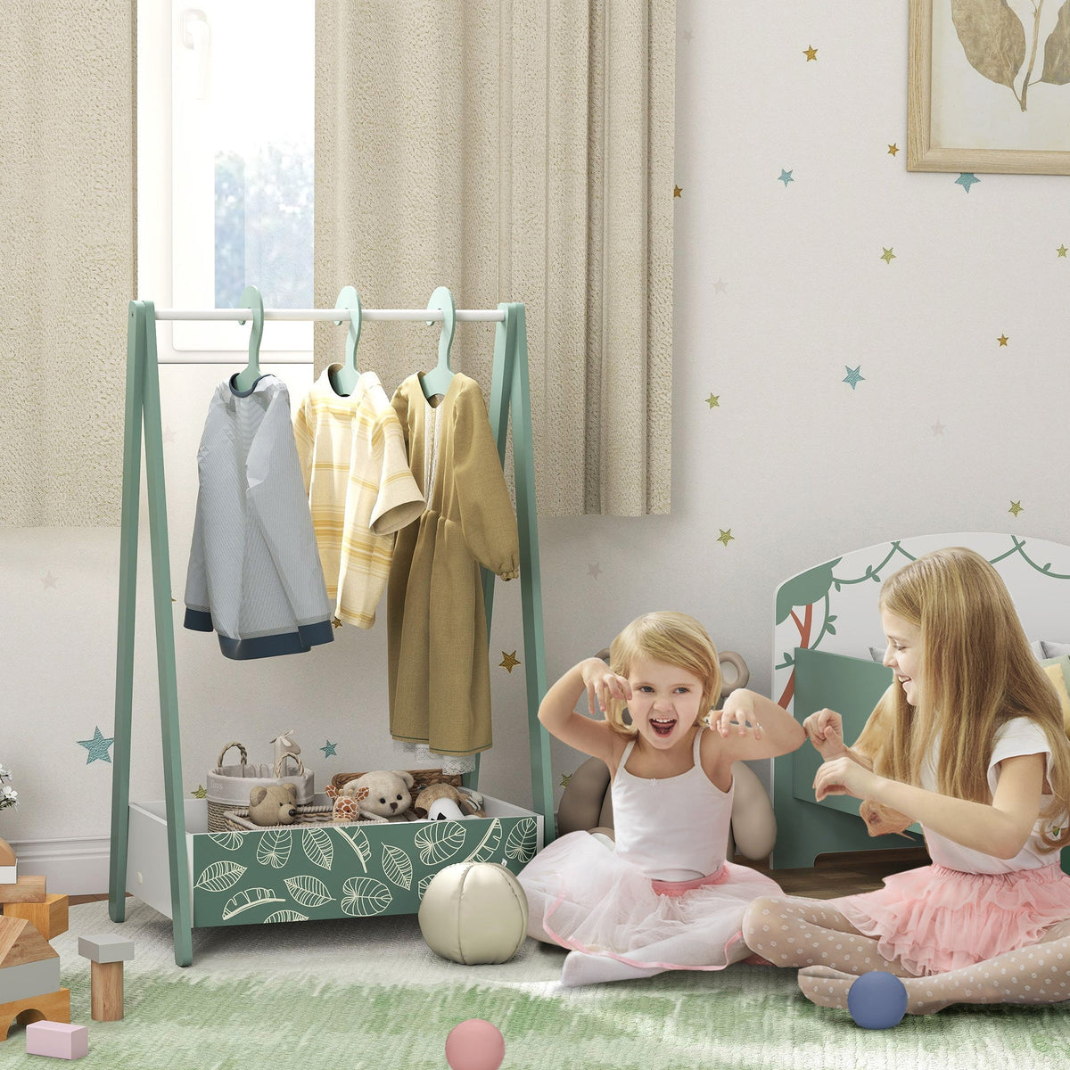 Mint green wooden AIYAPLAY baby clothing rack with white hanging rod and leaf-patterned storage tray for ages 3-6