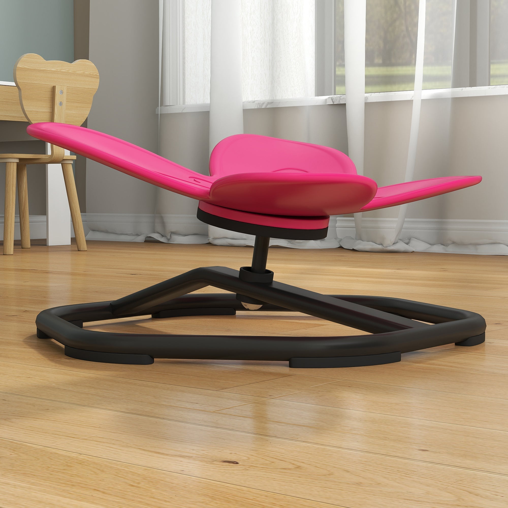 Bright pink butterfly-shaped sensory spinning chair with black base for balance and coordination training