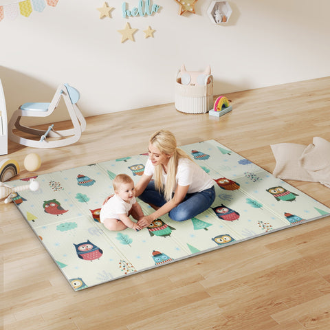 A soft light green ai yaplay foldable baby play mat 200l x 150w with colorful owl and car track patterns