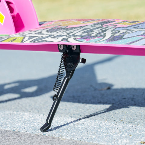 Black metal kickstand with spring on pink aiyaplay foldable kids scooter deck featuring rear brake and adjustable height levels