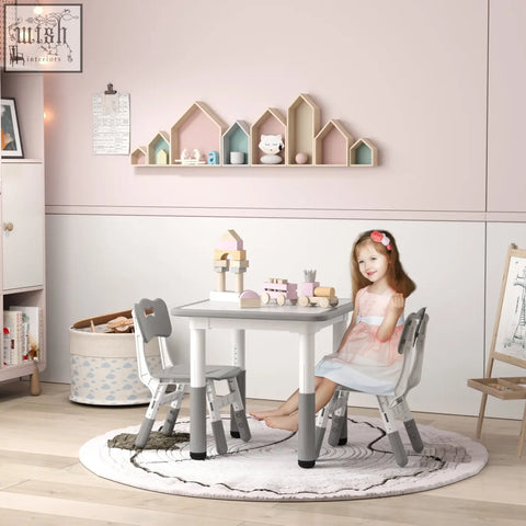 Gray and white aiyaplay toddler table and chair set with seven height adjustments for playroom or bedroom use