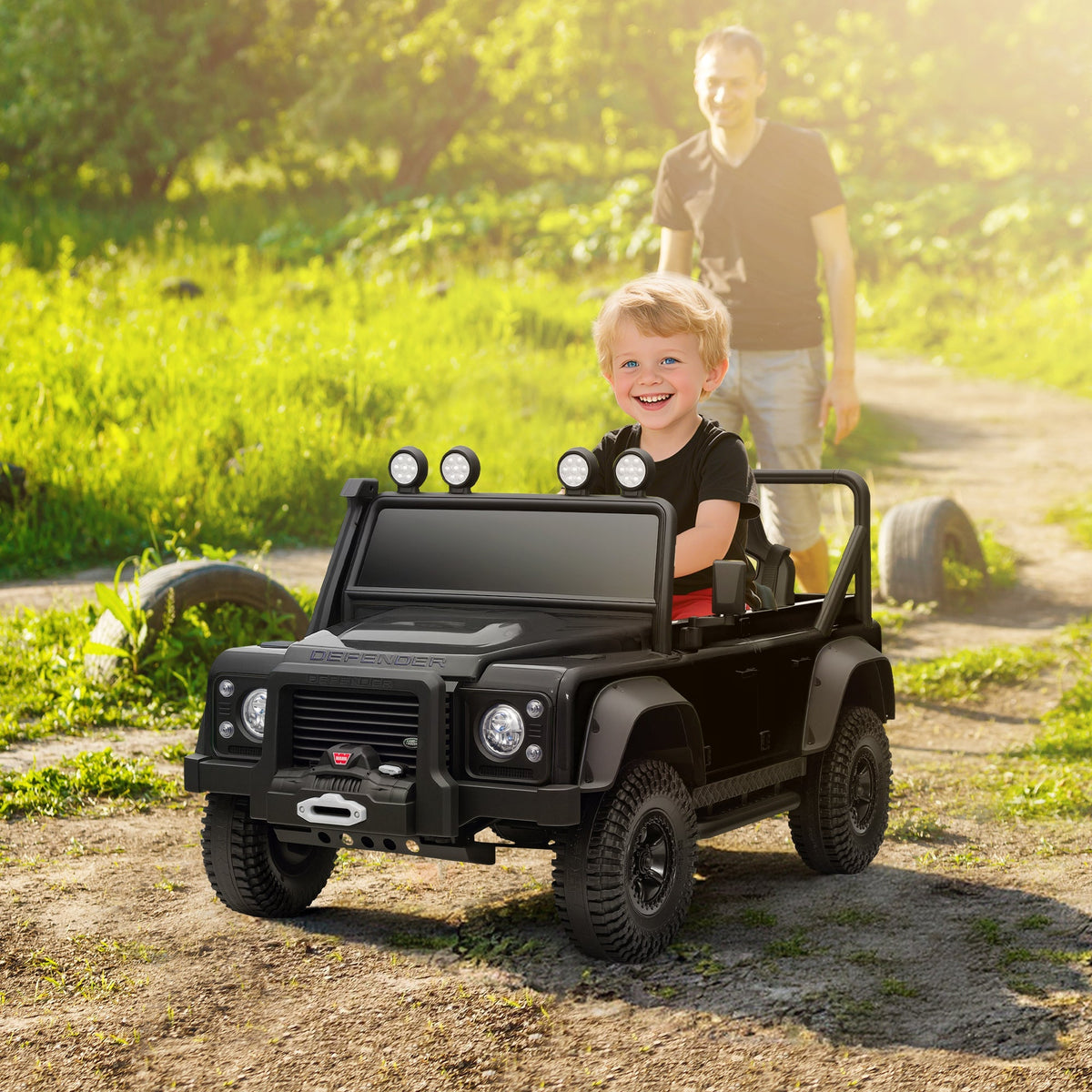 Black battery-powered toy car land rover defender kids ride on with remote control music and led lights