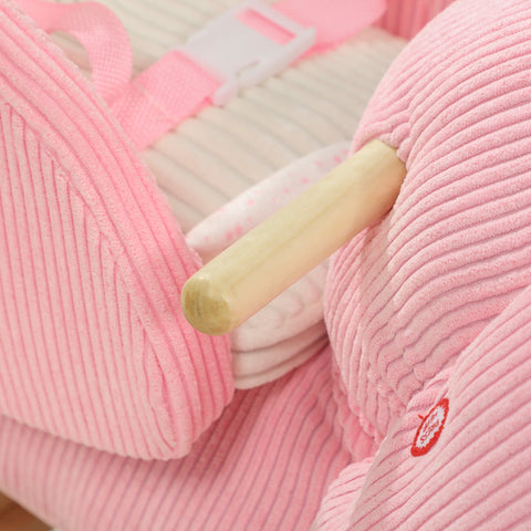 Pink corduroy baby carrier with light wooden handle and white buckle for aiyaplay rocking horse en71-1-2-3 item