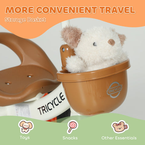 Aiyaplay kids orange trike with brown plastic front basket holding a white plush toy for indoor outdoor use