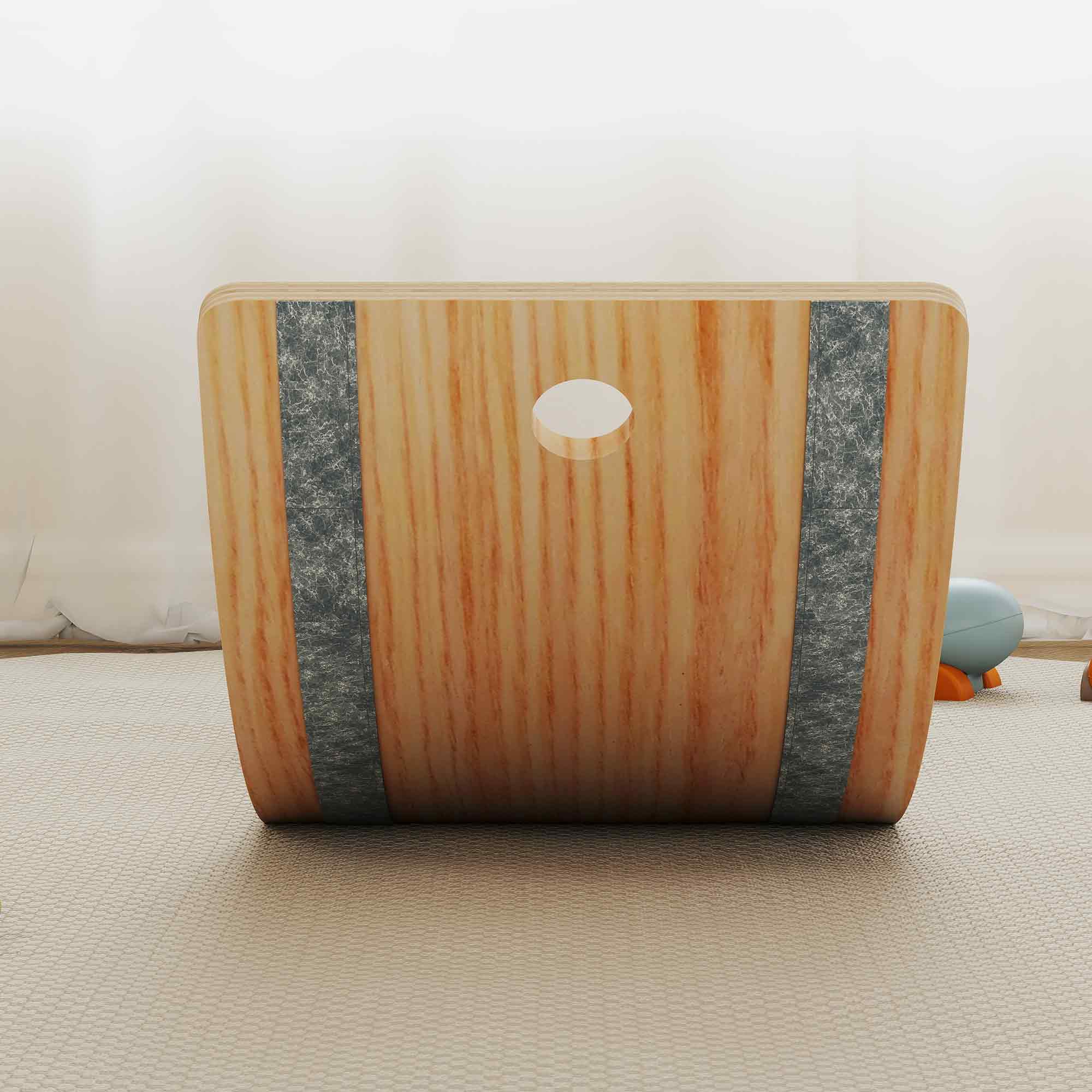 Light brown wooden kids balance board with two gray metal stripes and circular handle for sensory play