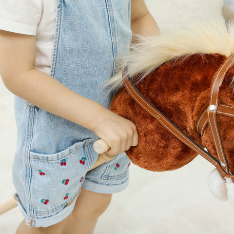 Aiyaplay brown plush hobby horse with white mane tan leather harness wood wheels and galloping sounds for outdoor play
