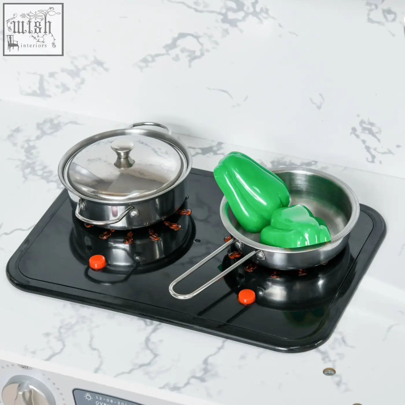 Stainless steel toy stove with two burners and orange knobs in grey aiyaplay kitchen playset with water dispenser