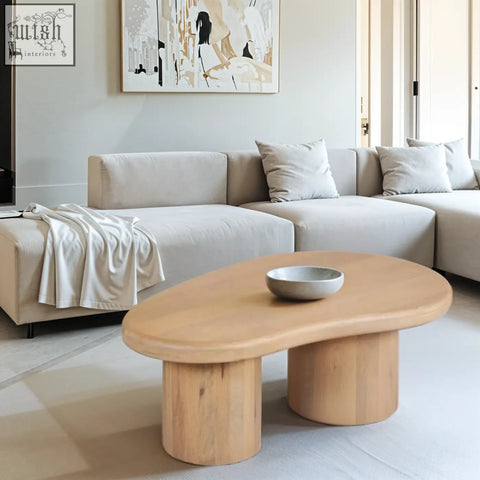 Ajmer solid wood coffee table with light wood oval top and two cylindrical legs in vibrant blue color